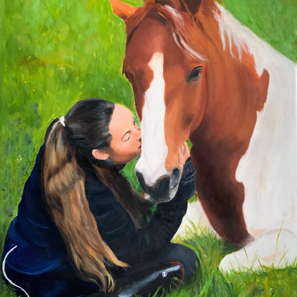 Flicka med sin häst